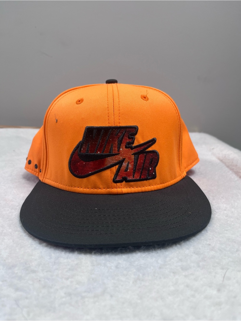 Nike Adults Orange and Black Snapback with Embroidered Nike Air